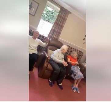 Elder enjoy with lovely sing along this morning at Orchard House