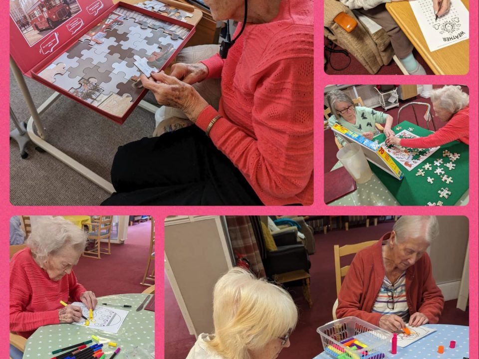 Ladies creating craft and puzzles slove at Orchard House