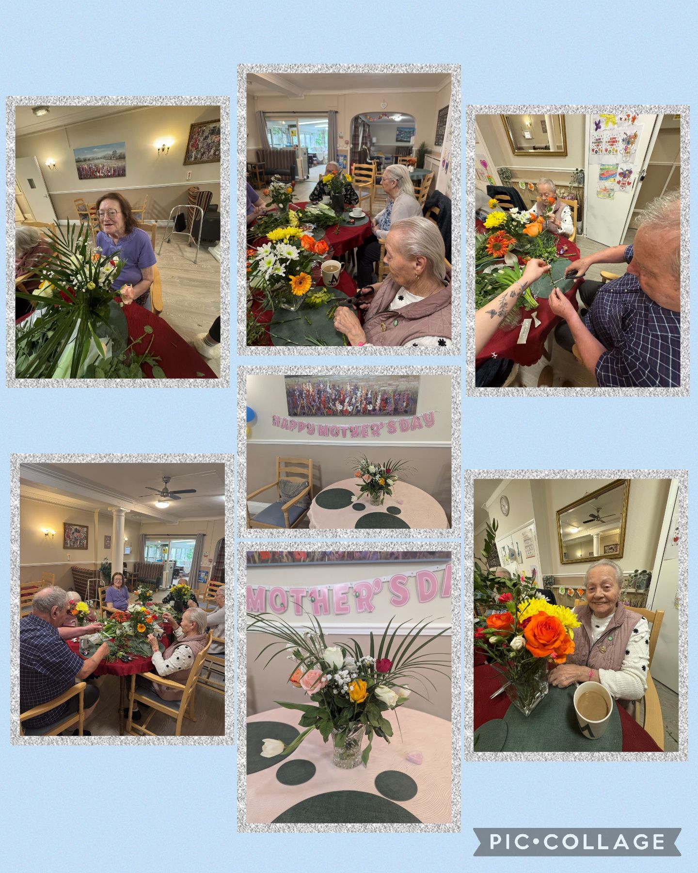 residents arranging colourful flowers together at a table to celebrate Mother’s Day