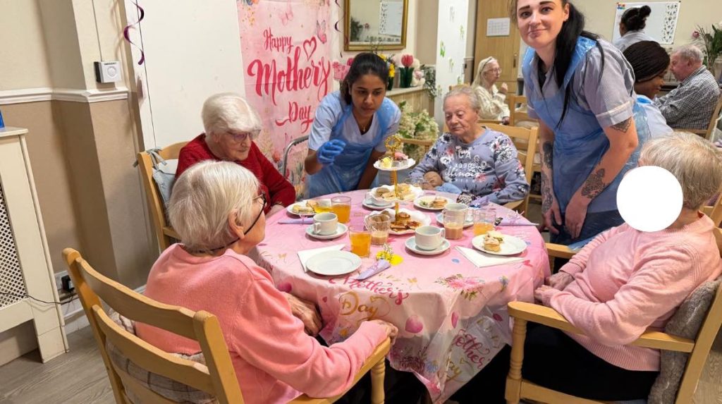 Residents celebrating Mother’s Day with staff