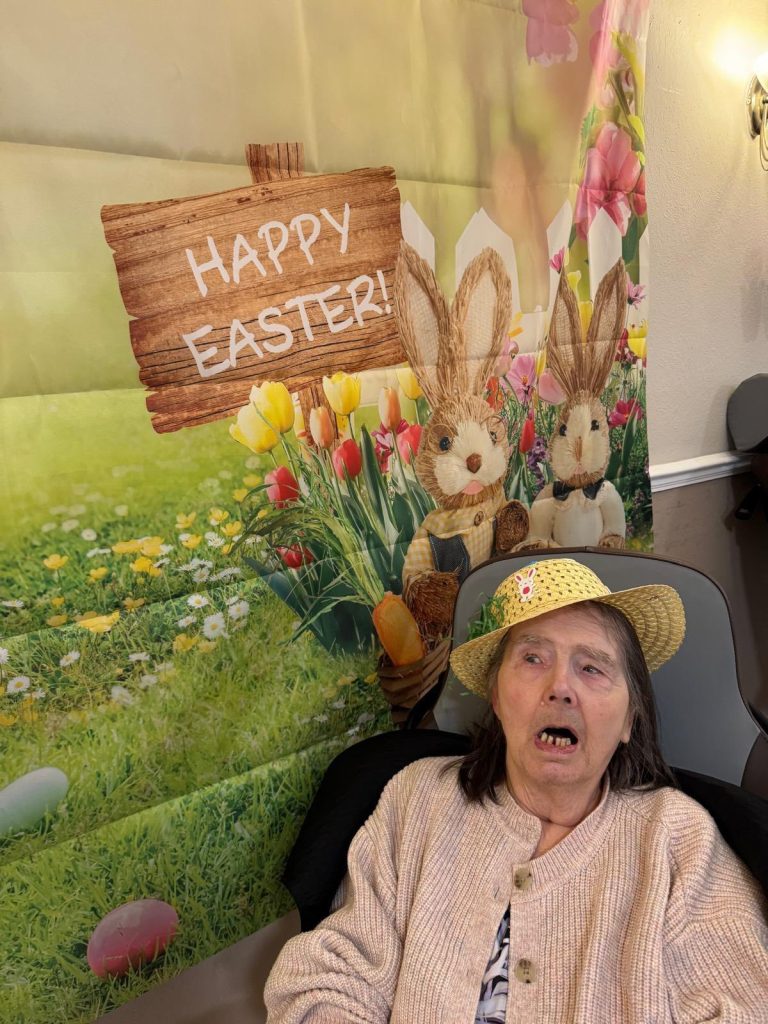 Decorations with flowers, pastel colors, and “Happy Easter” signs