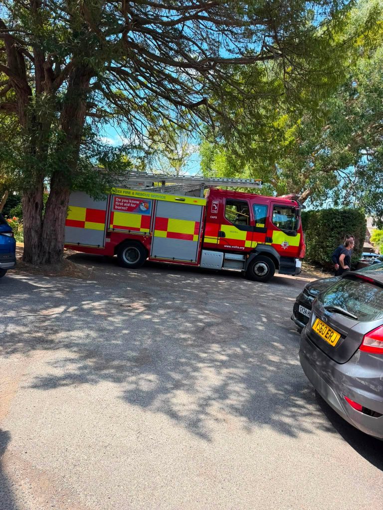 Fire engine parked outside Orchard House Nursing Home during a community visit.